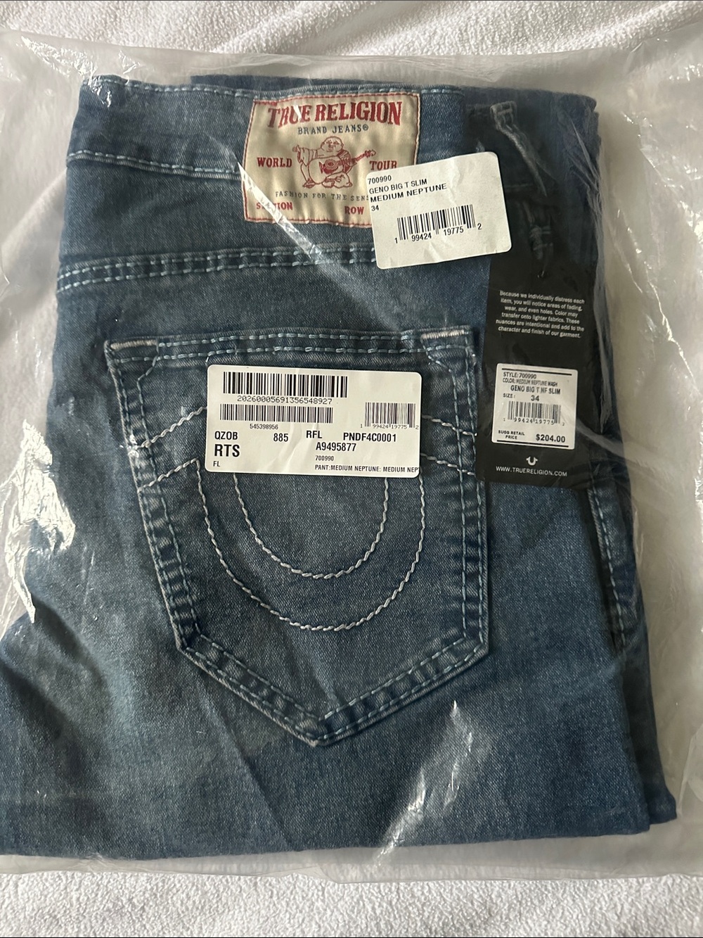 True Religion Men's Medium Blue Slim Jeans with Signature Stitching